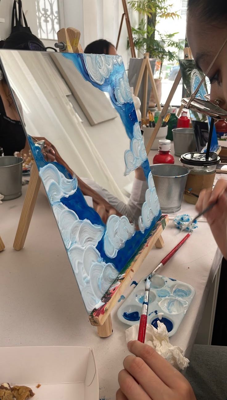 Creative workshop setup with canvas and craft tools